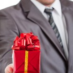 Red gift in hand